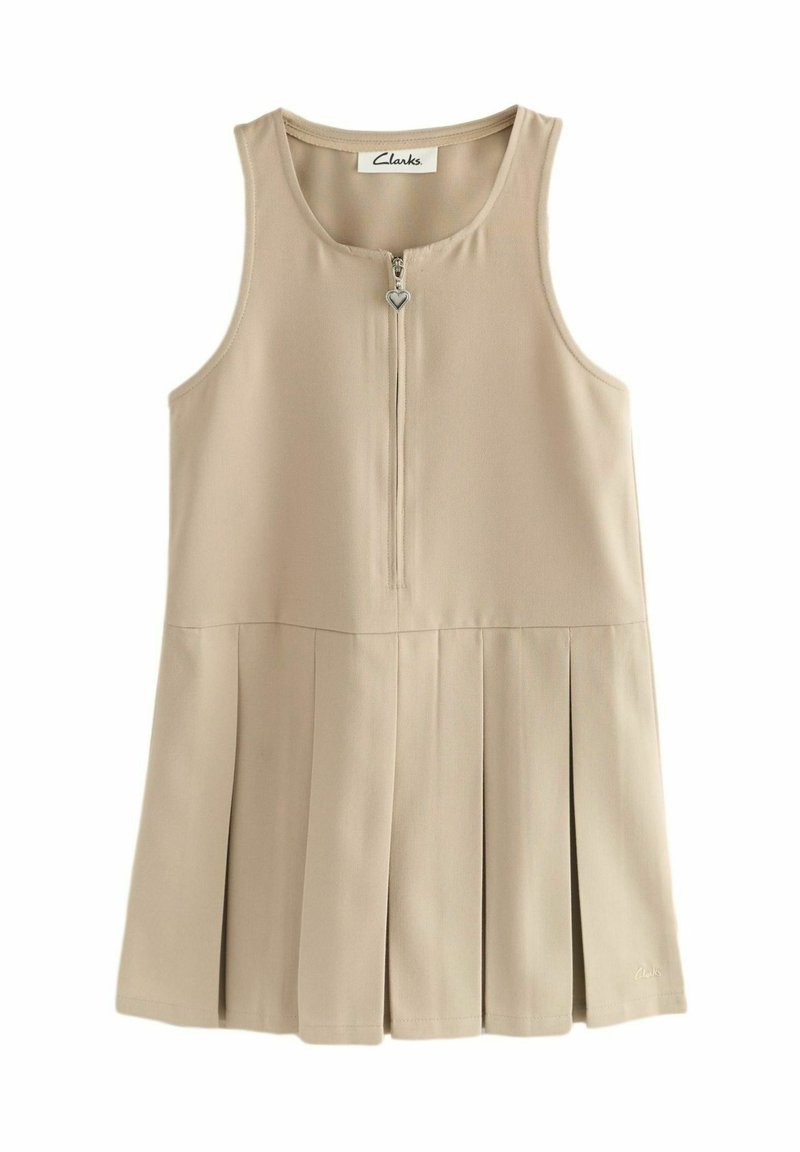 Beige mekko ilman hihoja, jossa on vetoketjulli edessä ja pleated hame. Valmistettu sileästä kankaasta, siinä on hienovarainen kiilto ja sydämen muotoinen vetoketjun vetoketju.