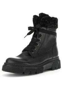 Sorte læder ankelstøvler med en kraftig sål, snørebåndsdesign og faux fur-krave. Har metalknapper og teksturerede sorte snørebånd.