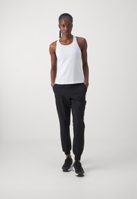 Casall COMFORT PANTS - Treniņtērpa apakšdaļas - black