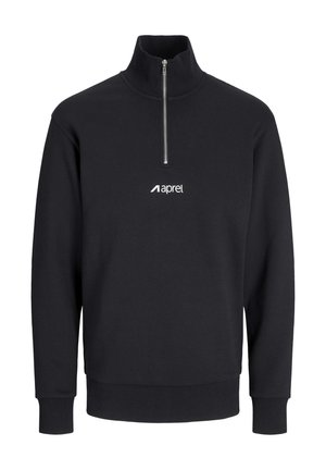 Mustast fliisist lukuga pusa kõrge kraega, ees lukuga ja valge "aprel" logo rinnal. Omaduseks on soonikkoes varrukapiirid ja alumine ääreosa.