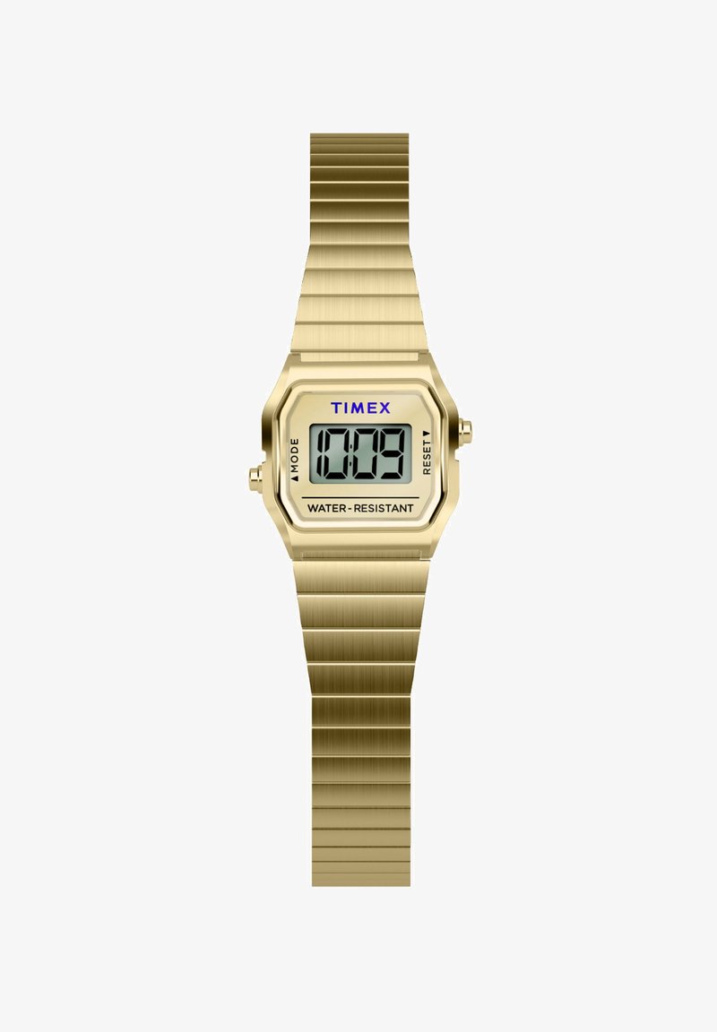 Orologio digitale Timex dorato con bracciale metallico espandibile che mostra l'ora 10:09, etichettato come resistente all'acqua, con pulsanti per la modalità e il reset.