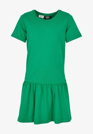 Zöld pamut ruha kerek nyakkivágással, rövid ujjakkal és fodros, harang alakú szegéllyel. Simább textúra, laza kialakítás és könnyű anyag.