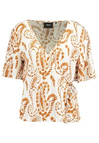 Haut à manches courtes, style enroulé en tissu crème avec un motif paisley orange. Avec un décolleté en V profond et un détail de lien sur le côté.