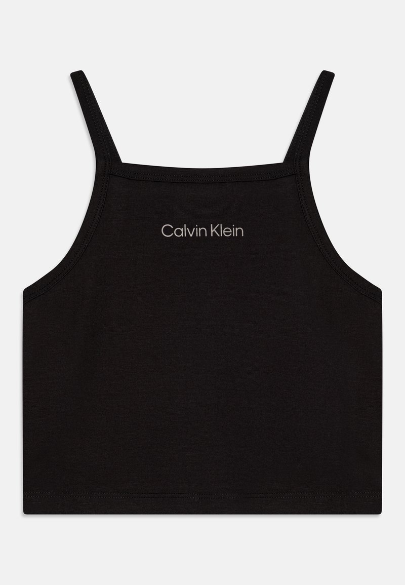 Černý přiléhavý top na ramínka s tenkými popruhy, na přední straně s jemným logem "Calvin Klein" v světle barevném písmu. Hladká textilie.