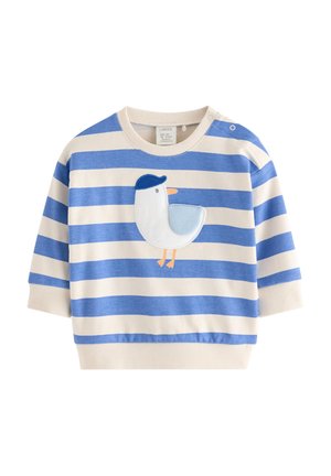 Langærmet skjorte til småbørn med blå og hvide vandrette striber samt en påsyet hvid fugl med blå kasket på fronten.