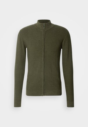 Khaki green zip-up sweater with a high collar, made of textured knit fabric, featuring long sleeves and a fitted silhouette.