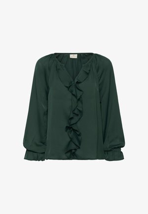 Blusa de manga larga de un verde oscuro, confeccionada en tejido ligero, con un escote en V profundo y volantes texturizados en el frontal. Puños elásticos.