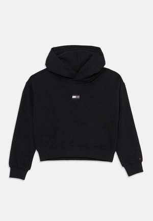 Felpa cropped nera realizzata in tessuto morbido. Caratterizzata da un cappuccio, maniche lunghe e una piccola etichetta con logo sul petto. Polsini e orlo a coste.