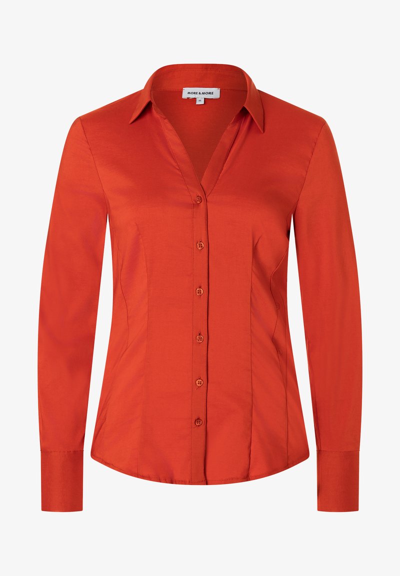 Langarmige, aansluitende shirt in feloranje, gemaakt van soepele stof; het heeft een klassieke kraag, knoopsluiting en op maat gemaakte naden.