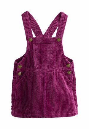 Lila kordflöjeloverall med justerbara remmar, ficka fram och två sidfickor. Har en ribbad struktur och metallknappar som accent.