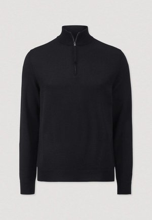 Zwarte rits-trui met opstaande kraag, lange mouwen en een gladde gebreide textuur. De sluiting heeft een korte rits bij de nek.