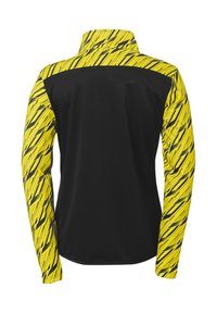 Langsleeve sportjack met een zwart lichaam en levendig gele mouwen met een diagonale streepjespatroon. Hoge kraag, gladde textuur.