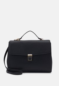 Sac à main structuré noir avec une texture lisse, une fermeture en métal doré et une bandoulière amovible. Il dispose d'une poignée supérieure et d'un design épuré.