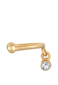Pendiente en tono dorado con un diseño curvado, que presenta una pequeña bola redonda en un extremo y un lazo colgante con un acento de cristal transparente.