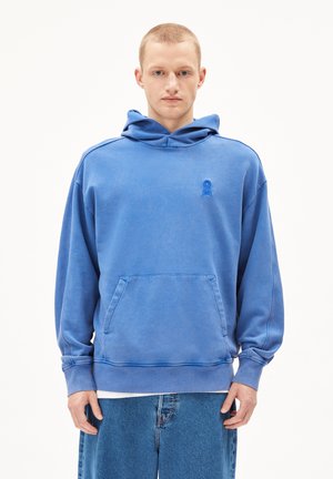 Blue hoodie with a textured finish, front pocket, and adjustable drawstring hood. Features a small blue logo on the chest and ribbed cuffs.