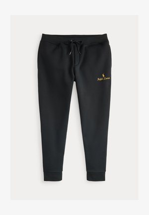 Melnas sporta bikses, kas izgatavotas no mīksta auduma, ar elastīgu jostasvietu un auklu, ribotām aprocēm un zeltītā izšūtā logo.