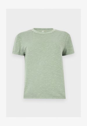 T-shirt vert clair à manches courtes avec col rond et texture subtile, présenté sur un fond blanc uni.