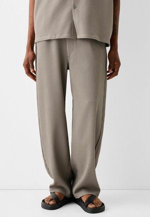 Spodnie materiałowe