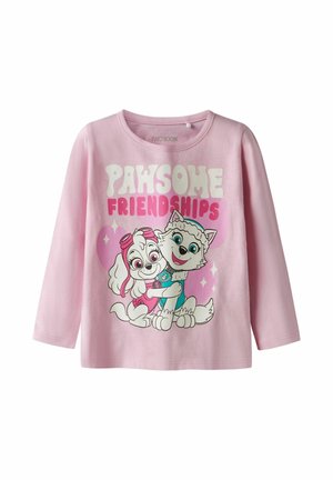 Pink long-sleeve shirt featuring two cartoon dogs embracing, with the text "PAWSOME FRIENDSHIPS" in bold white and pink letters. Cotton material.