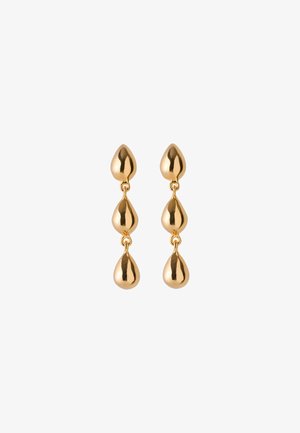 Minđuše na kapljicu u zlatnoj nijansi s tri povezana glatka segmenta u obliku suze, svaka na bijeloj pozadini.