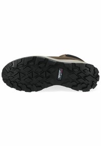 Suela de zapato de exterior marrón que presenta un grueso caucho negro texturizado con profundos patrones de tracción y un pequeño logotipo insertado.