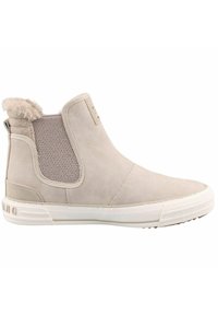 Bottine beige avec panneau latéral élastique, semelle en caoutchouc blanche et doublure en fausse fourrure beige au talon, conçue pour un usage décontracté.
