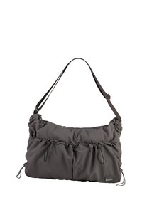 Gray shoulder bag made of soft, textured fabric. It features two front pockets, a cinched design, and an adjustable strap. Logo on the side.