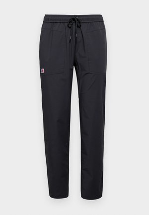Pantaloni jogger neri con vita regolabile tramite cordino, due tasche frontali e un piccolo logo decorativo. Realizzati in un tessuto morbido e leggero.