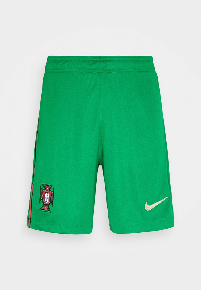 Green soccer shorts made of lightweight fabric with an elastic waistband. Features a gold Nike logo on the right and a colorful emblem on the left.