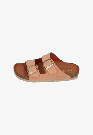 Light pink sandals with two adjustable straps, metallic buckles, and a cork footbed. Textured rubber sole and "ROHDE" branding visible.
