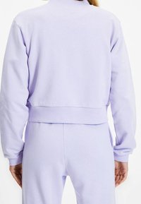 Trendyol Felpa con zip - purple