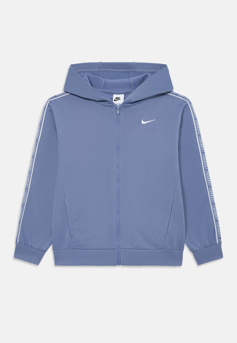 Nike zip-up hoodie i ljusblått, tillverkad av mjukt material, med en framdragbar dragkedja, huva och logotyp. Vita sidodekorationer med varumärkestext.