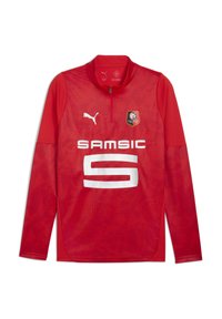 Maglietta sportiva rossa a maniche lunghe con zip a quarto, tessuto testurizzato, logo e testo bianco "SAMsic" con un grande numero "5", emblema della squadra sul petto sinistro.