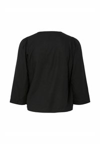 Blouse noire à manches longues avec épaules légèrement bouffantes et ourlet droit, vue de dos sur fond blanc.