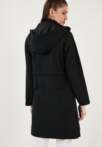LELA REGULAR FIT - Parka - black