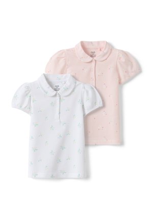 Zwei kurzärmelige Kinder-Poloshirts mit Puffärmeln, eines weiß mit pastelligem Blumenmuster und eines hellrosa mit kleinem Blumenmuster.