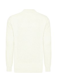 Maglione bianco a maglia con maniche lunghe, caratterizzato da una sottile trama, scollatura a V e una patta con tre bottoni sulla parte posteriore.