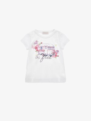 Hvit t-skjorte for småbarn med en rosa bobilsbuss, blomsterdetaljer og teksten "be free" på forsiden.