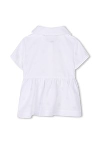 Valkoinen lyhythihainen vauvan mekko, jossa kaulus ja kerätty vyötärö, ja hienovaraiset kohokuvioidut logokuvioinnit koko kankaassa.