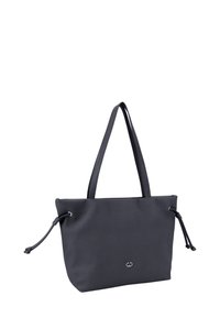 Dark gray tote bag made of smooth fabric. Features two long handles, drawstring accents, and a simple silver logo on the front.