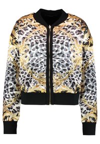 Korte bomberjack van glanzende stof met een luipaardprint en gouden barokpatroon. Zwart geribbeld manchet en kraag, ritssluiting.