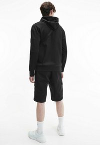 Calvin Klein RELAXED - Felpa con cappuccio - ck black