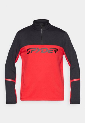 Viertel-Reißverschluss-Pullover mit einem dunkelgrauen oberen Bereich und einem leuchtend roten unteren Abschnitt, der ein auffälliges schwarzes "SPYDER"-Logo auf der Brust trägt.