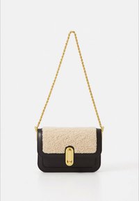 Black leather crossbody bag with a beige fleece flap, gold chain strap, and a gold clasp detail on the front, featuring a structured shape.