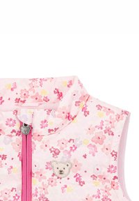 Blumenweste in Pink, mit einem Reißverschluss und einem ziehbaren, bärenförmigen Verschluss, sowie einem kleinen Bären, der auf der Brust gestickt ist.
