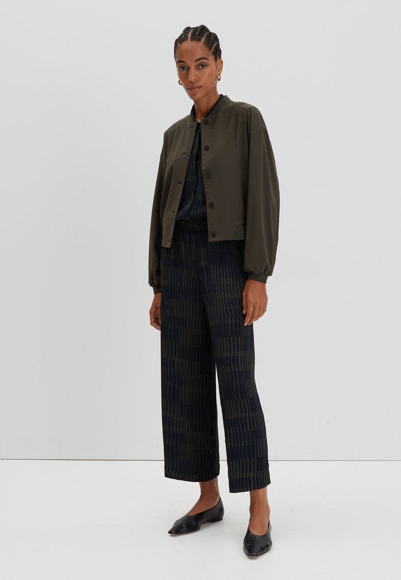 someday. Jumpsuit groen