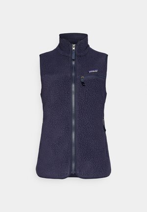 Γιλέκο από φλις σε ναυτικό μπλε με ψηλό γιακά, πλήρες μπροστινό φερμουάρ και μία τσέπη στο στήθος. Υφασμένο ύφασμα με απαλό και βελούδινο χρώμα.