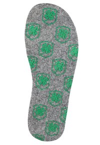 Gray felt insole with green four-leaf clover emblem, featuring repeated shield patterns, smooth texture, and contoured shape for foot support.