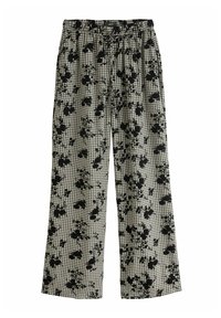 Pantalon à carreaux noir et blanc avec un motif floral, équipé d'une taille élastique et de jambes larges pour un ajustement confortable.