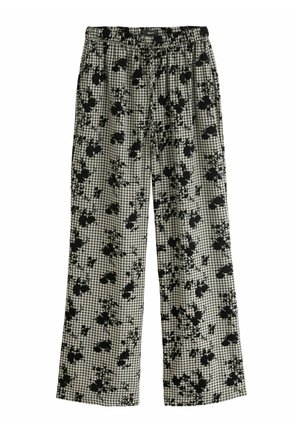 Pantalon à carreaux noir et blanc avec un motif floral, équipé d'une taille élastique et de jambes larges pour un ajustement confortable.
